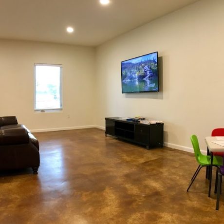 rec area with seating and tv