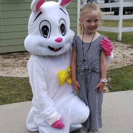 kid smiling with easter bunny